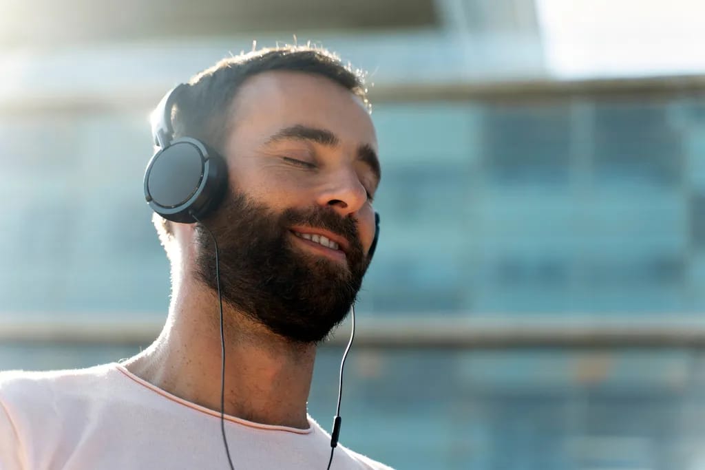 Person listening with headphones
